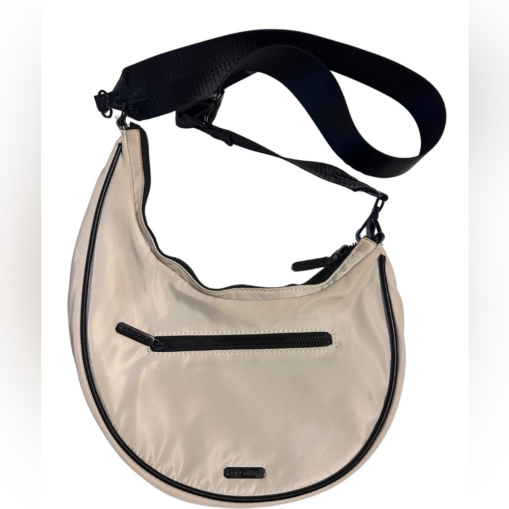 BCBGeneration crossover bag. Inside - 2 open pockets/1 zipper. Exterior zipper.